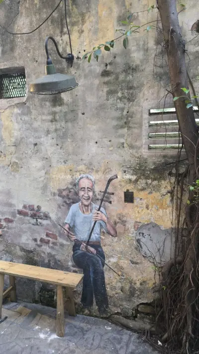 Street Art Mural Old Man Playing Violin Penang - stock photo