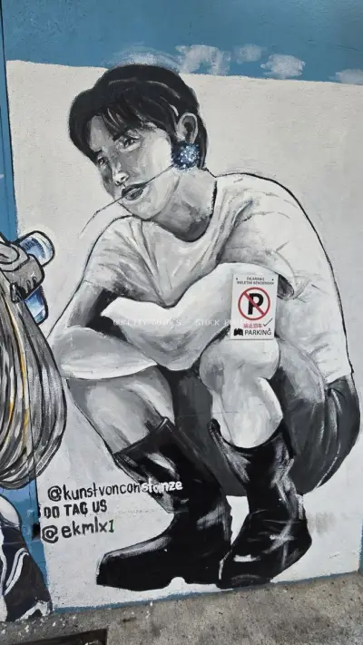 Street Art Mural Woman No Parking Sign Kuala Lumpur - stock photo
