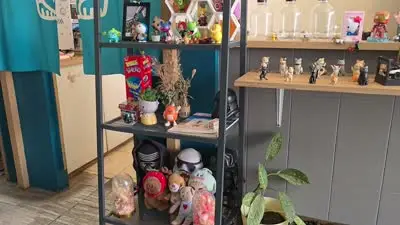 Quirky Cafe Interior B-Roll Footage with Collectibles and Japanese Decor - stock photo