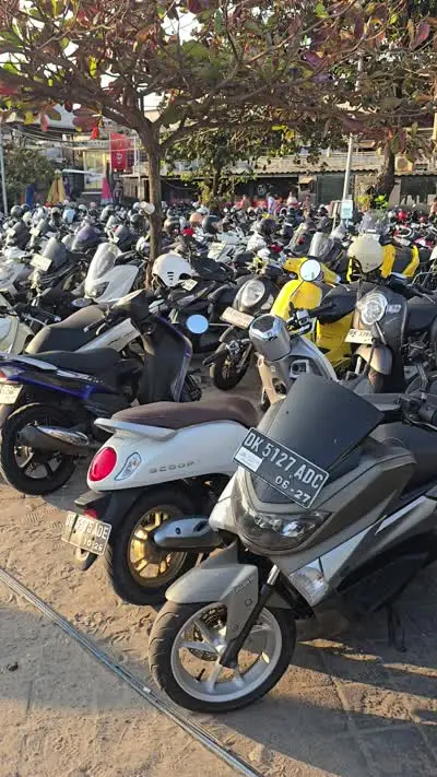 Bali Scooter Parking Lot B-Roll Footage at Pantai Batu Bolong - stock photo